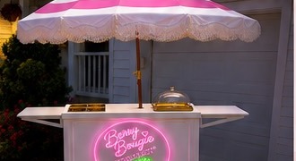 Berry Bougie dessert cart set up outdoors for an event
